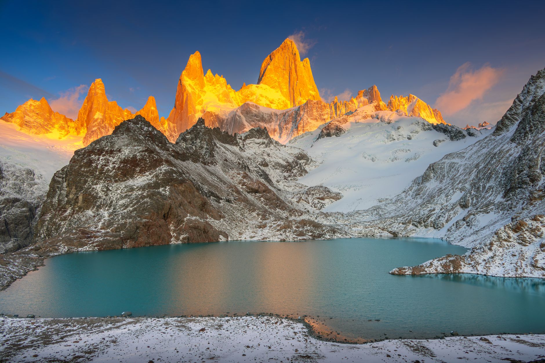 Expansive Patagonian landscape with dramatic sky and distant glacier